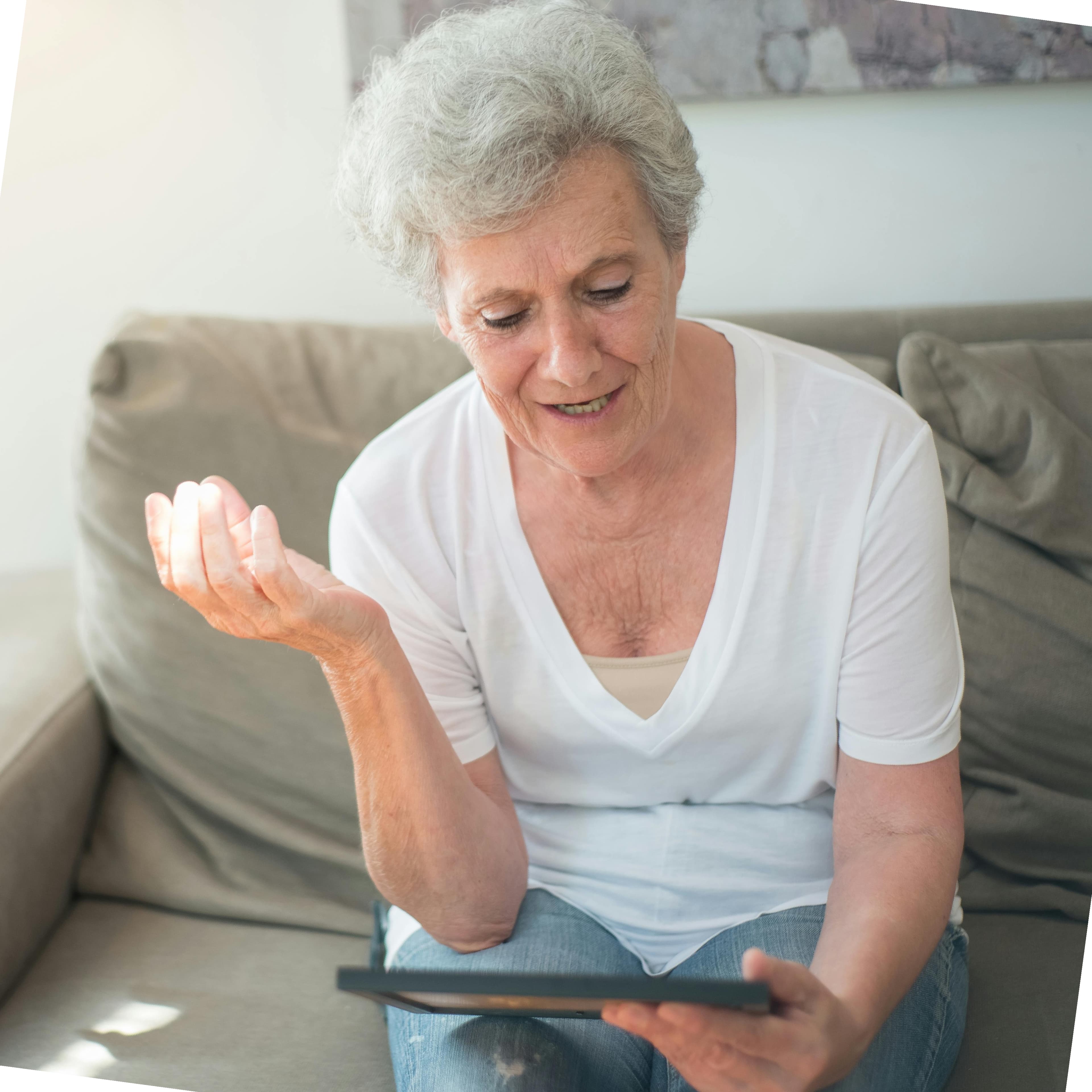 Patient using a tablet during a speech therapy session